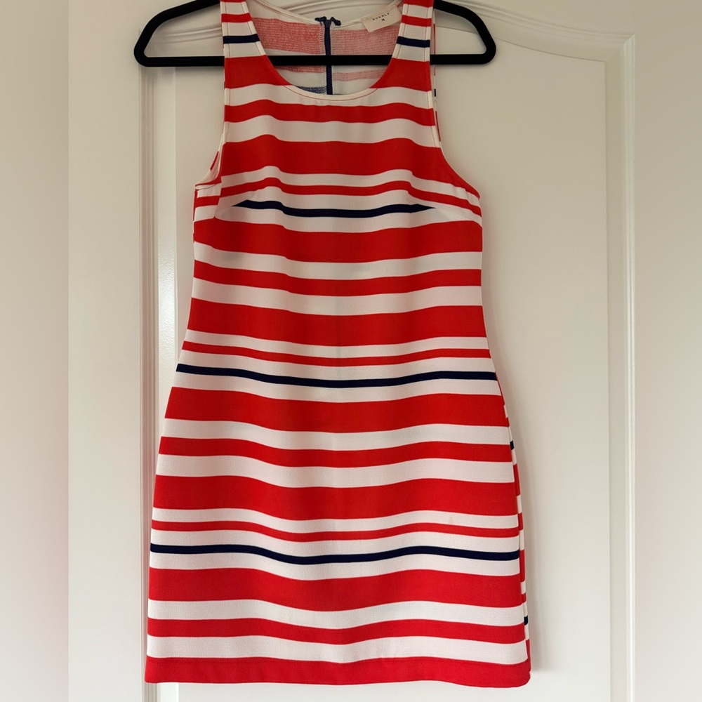 Eye catching orange, white and navy sheath dress
